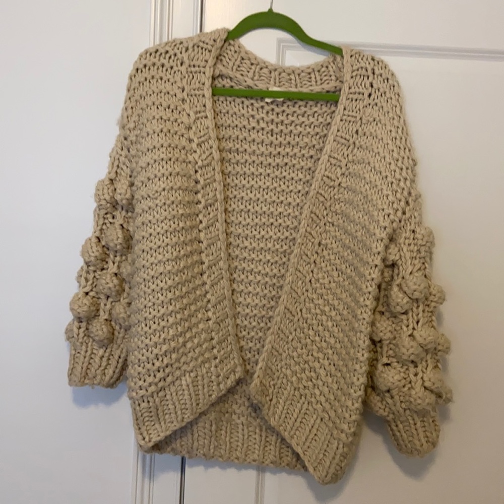 cream boutique cardigan. one size